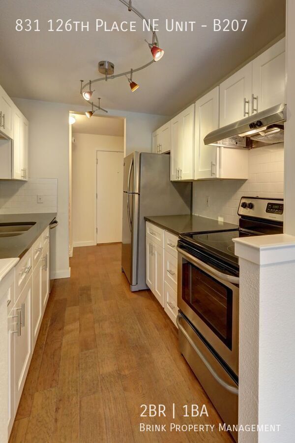 Prime Bellevue Location | 2 Bed Condo + Garage + Pool property image