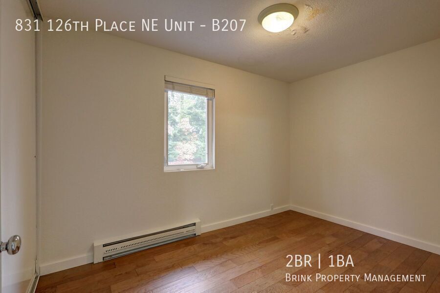 Prime Bellevue Location | 2 Bed Condo + Garage + Pool property image
