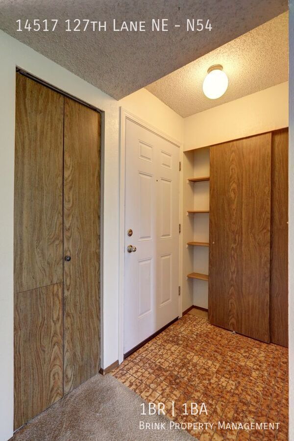Clean Top Floor 1BR 1BA Condo with Wood Burning Fireplace property image